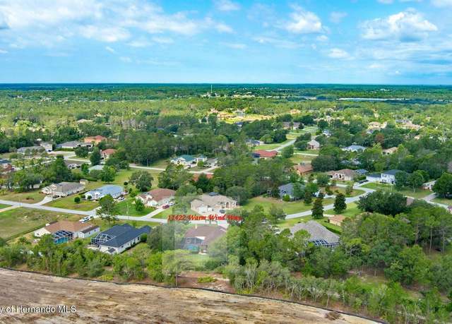 Property at 11422 Warm Wind Way, Weeki Wachee, FL 34613, 4 beds, 3 baths