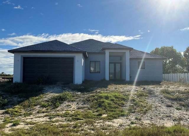 Property at 1015 NW 12th Ave, Cape Coral, FL 33993, 4 beds, 2 baths