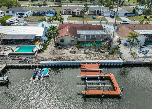 Property at 727 Flamingo Dr, Apollo Beach, FL 33572, 4 beds, 2 baths
