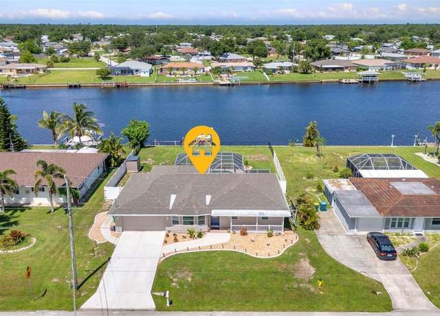 Property at 806 Ellicott Cir NW, Port Charlotte, FL 33952, 4 beds, 2 baths