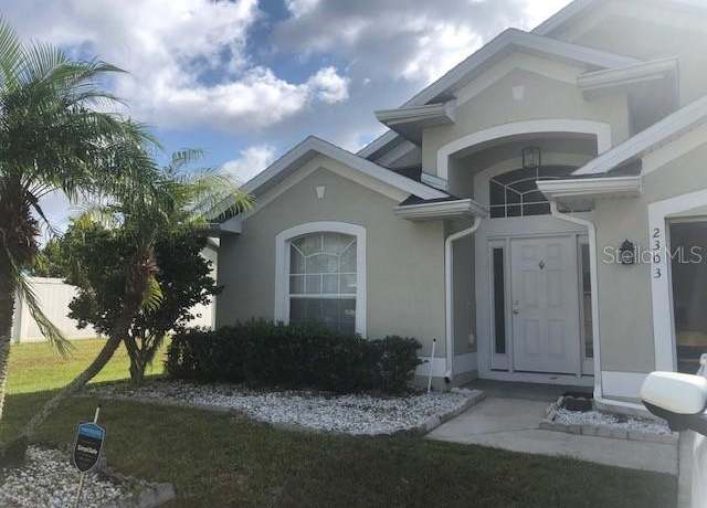 Property at 2303 Walnut Canyon Dr, Kissimmee, FL 34758, 4 beds, 2 baths