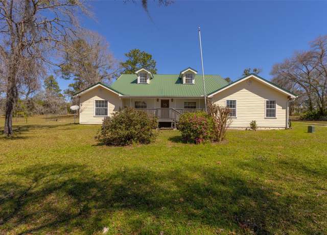 Property at 6500 NE 32nd Pl, High Springs, FL 32643, 4 beds, 3 baths
