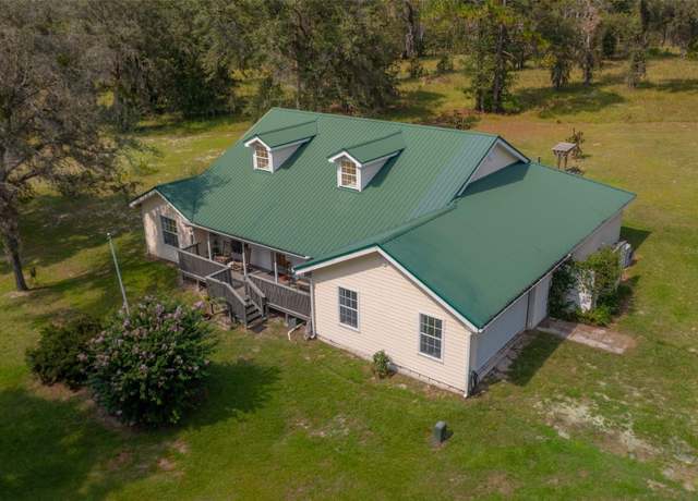 Property at 6500 NE 32nd Pl, High Springs, FL 32643, 4 beds, 3 baths