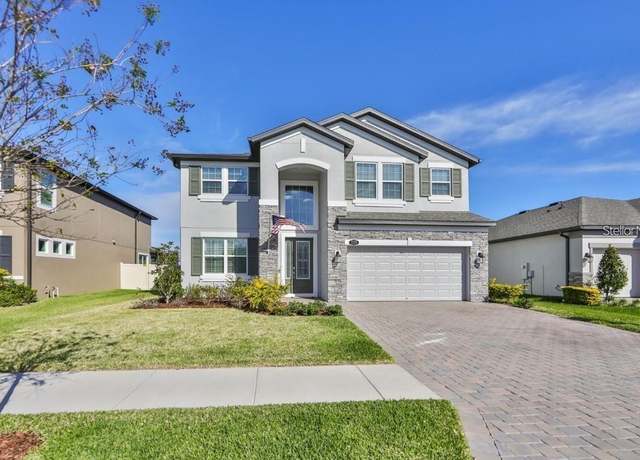 Property at 19293 Breynia Dr, Lutz, FL 33558, 5 beds, 3.5 baths