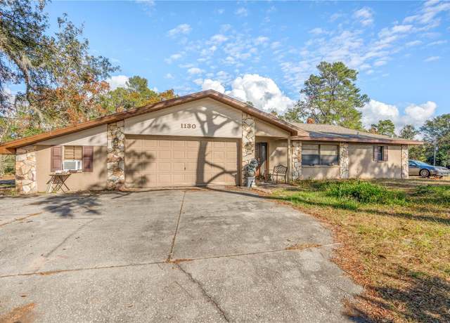 Property at 1130 Barranca Ave, Spring Hill, FL 34609, 4 beds, 2 baths