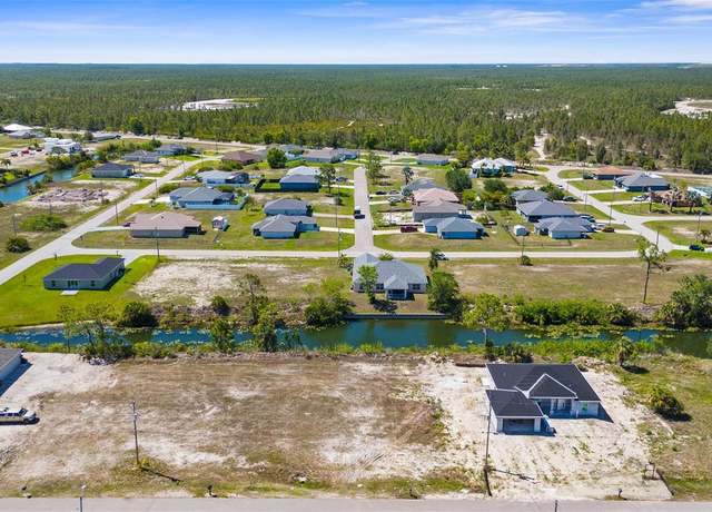 Property at 1013 NE 44th St, Cape Coral, FL 33909