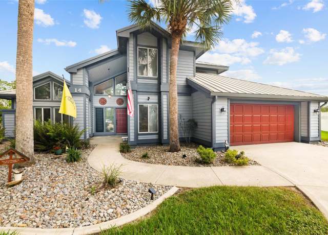 Property at 14 Lake Pl, Palm Coast, FL 32137, 4 beds, 3 baths