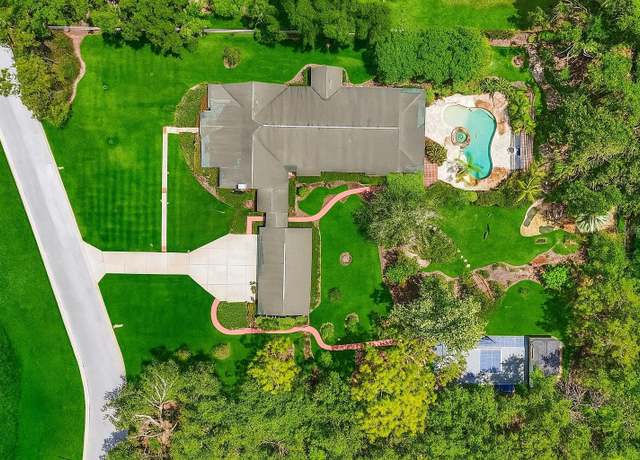 Property at 2501 Rustic Oaks Dr, Lutz, FL 33559, 4 beds, 2.5 baths