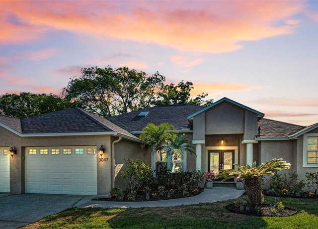 Property at 3047 Lake Padgett Dr, Land O Lakes, FL 34639, 4 beds, 3 baths