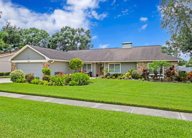 Property at 13810 Lake Village Pl, Tampa, FL 33618, 4 beds, 2 baths