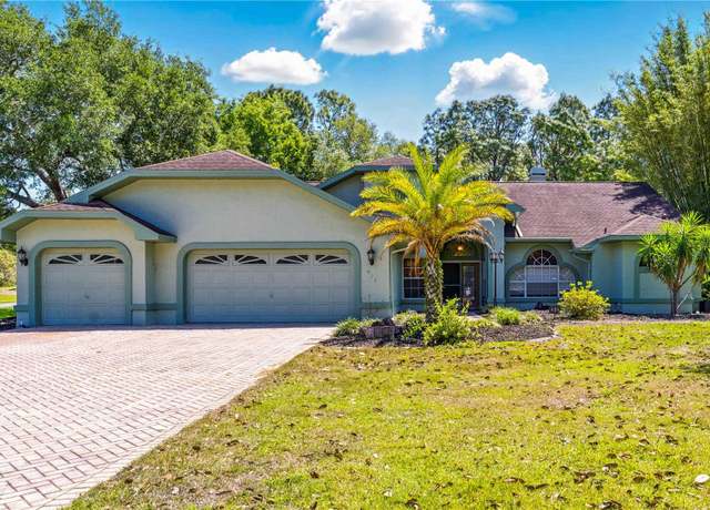 Property at 424 Knights Bridge Rd, Spring Hill, FL 34609, 4 beds, 3 baths
