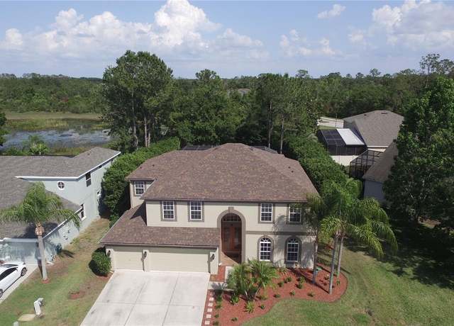 Property at 7334 Night Heron Dr, Land O Lakes, FL 34637, 5 beds, 4 baths