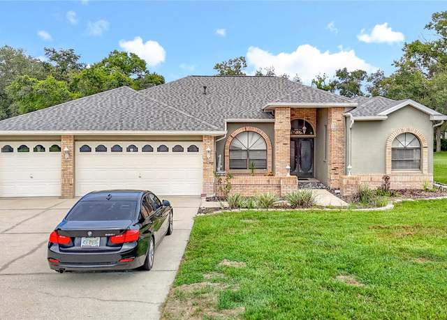 Property at 18196 Winding Oaks Blvd, Hudson, FL 34667, 4 beds, 3 baths
