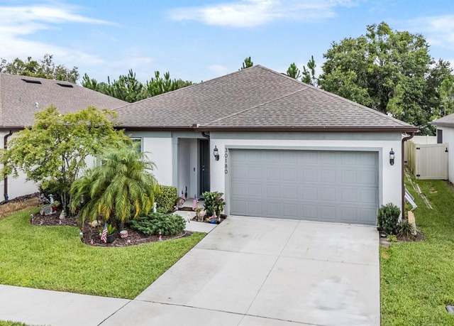 Property at 30180 Skylark Dr, Wesley Chapel, FL 33545, 4 beds, 2 baths