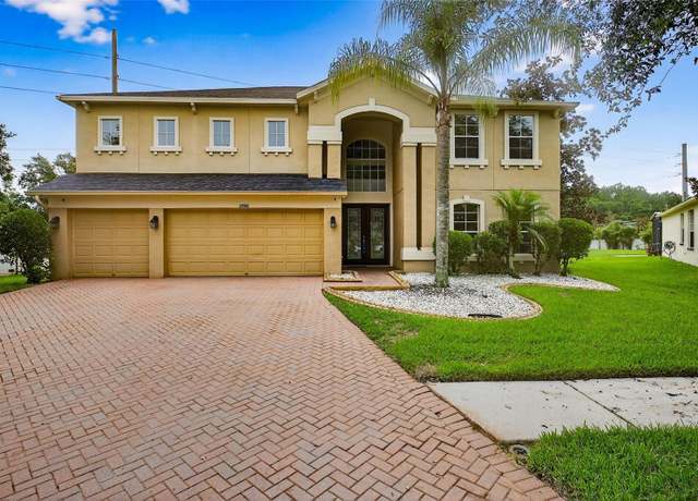 Property at 29916 Cedar Waxwing Dr, Wesley Chapel, FL 33545, 5 beds, 4 baths
