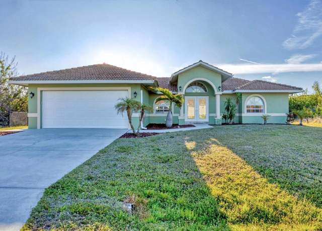 Property at 9219 Newnan Cir, Port Charlotte, FL 33981, 4 beds, 2.5 baths