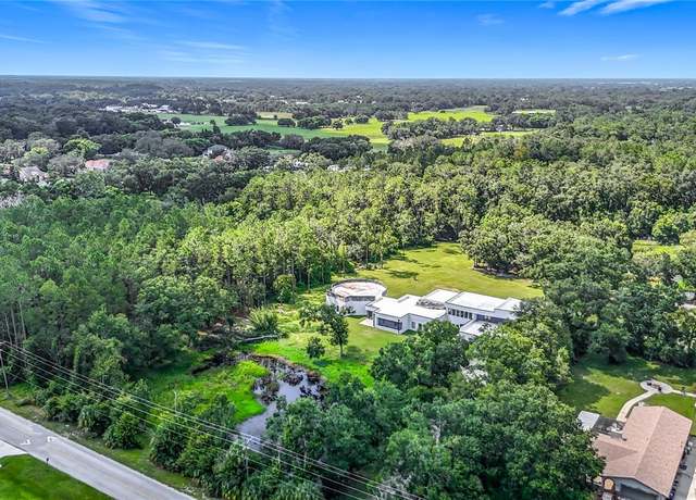 Property at 2518 Sunset Ln, Lutz, FL 33559, 6 beds, 6 baths