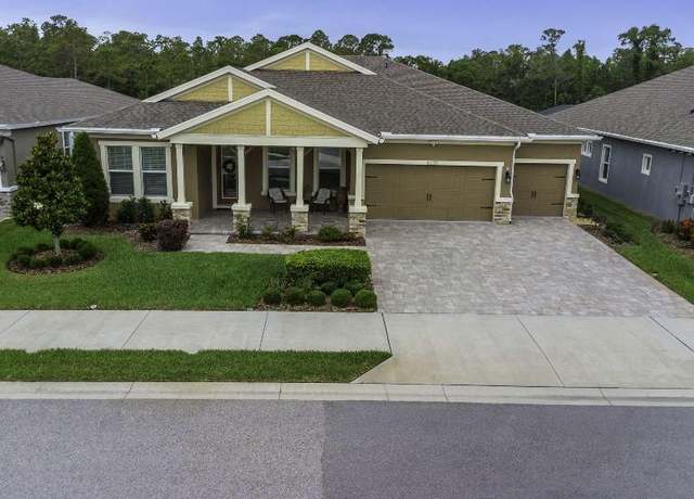 Property at 4239 Woodland Retreat Blvd, New Port Richey, FL 34655, 4 beds, 3 baths