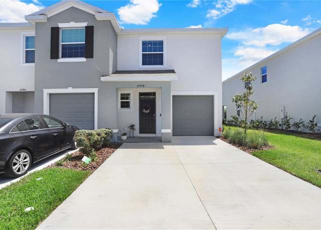Property at 32978 Tulip Petal Ln, Wesley Chapel, FL 33545, 3 beds, 2.5 baths