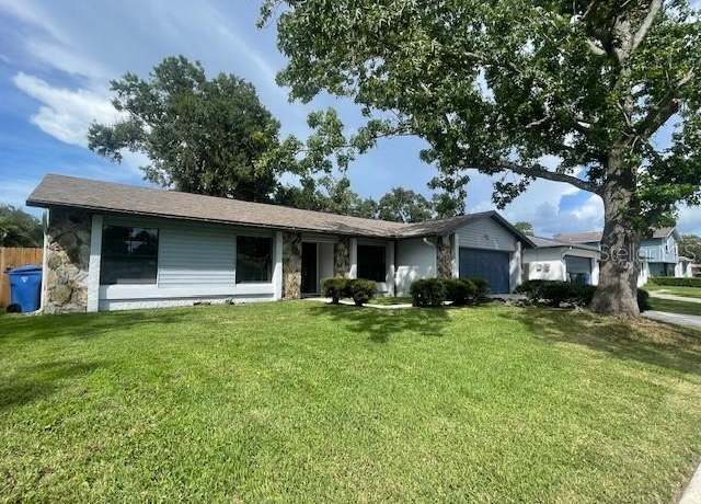 Property at 4421 Ranchwood Ln, Tampa, FL 33624, 4 beds, 2.5 baths