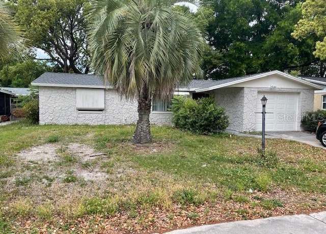Property at 7041 Oakshire Dr, Port Richey, FL 34668, 3 beds, 2 baths