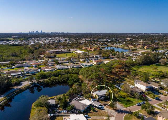 Property at 346 80th Ave NE, St Petersburg, FL 33702, 4 beds, 3 baths