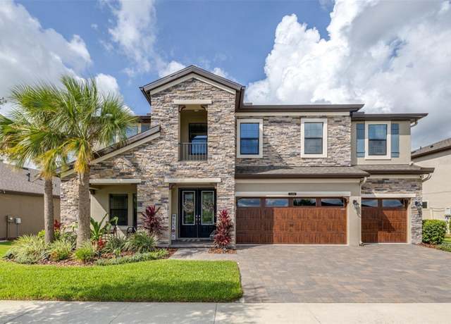 Property at 21896 Emory Oak Pl, Land O Lakes, FL 34637, 5 beds, 4 baths