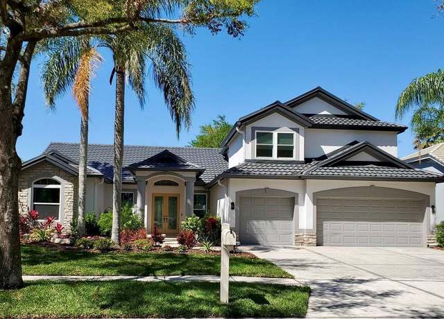 Property at 10218 Garden Alcove Dr, Tampa, FL 33647, 5 beds, 3 baths