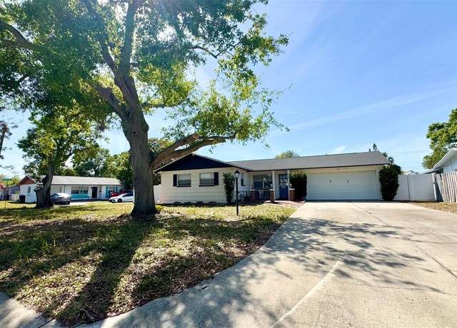 Property at 232 SE Monroe Cir N, St Petersburg, FL 33703, 4 beds, 2 baths