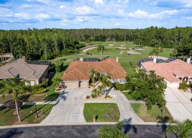 Property at 3337 Crescent Oaks Blvd, Tarpon Springs, FL 34688, 5 beds, 4 baths