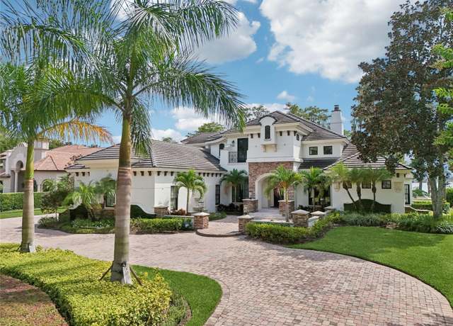 Property at 5550 Osprey Isle Ln, Orlando, FL 32819, 5 beds, 5.5 baths