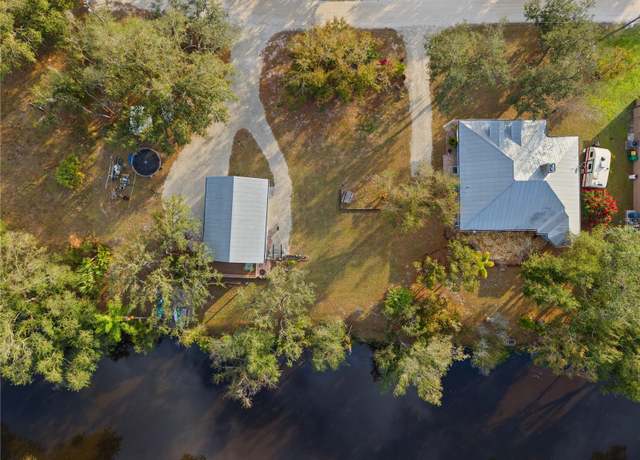 Property at 27350 San Carlos Dr, Punta Gorda, FL 33983, 4 beds, 3.5 baths