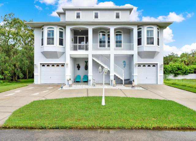 Property at 5413 Tropical Woods Ct, Port Richey, FL 34668, 4 beds, 2.5 baths