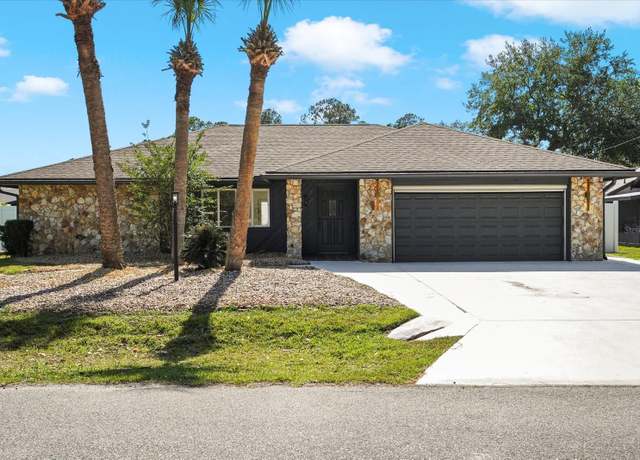 Property at 24 Berkshire Ln, Palm Coast, FL 32137, 4 beds, 2 baths