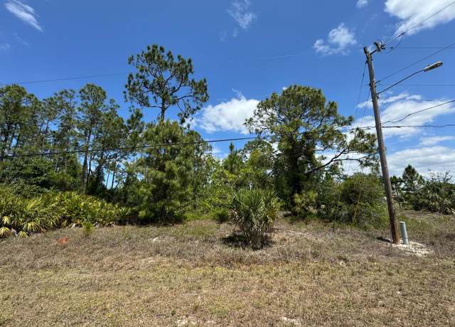 Property at 513 Addison St E, Lehigh Acres, FL 33974
