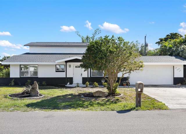 Property at 177 Dowling Ave NE, Port Charlotte, FL 33952, 4 beds, 3 baths