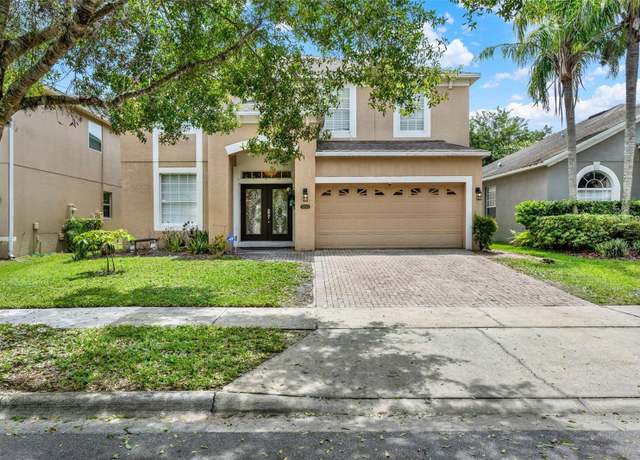 Property at 12955 Moss Park Ridge Dr, Orlando, FL 32832, 4 beds, 2.5 baths
