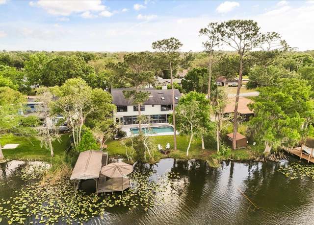 Property at 8041 Lake Waunatta Dr, Winter Park, FL 32792, 5 beds, 4.5 baths
