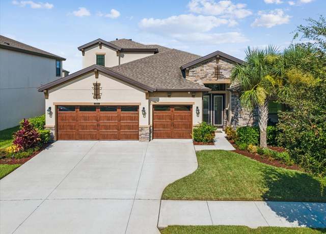 Property at 22011 Emory Oak Pl, Land O Lakes, FL 34637, 4 beds, 4 baths