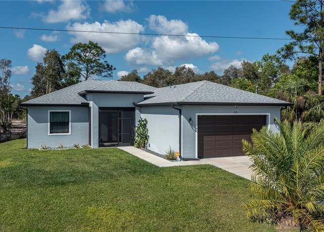 Property at 816 Bell Blvd S, Lehigh Acres, FL 33974, 4 beds, 2 baths