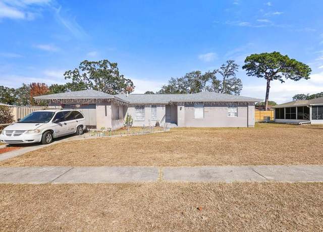 Property at 7143 Pear Ln, Spring Hill, FL 34606, 4 beds, 2 baths