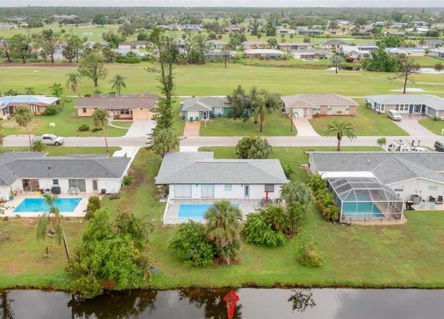 Property at 25 Caddy Rd, Rotonda West, FL 33947, 3 beds, 2 baths