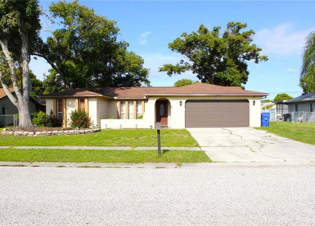Property at 4125 Riverwood Dr, New Port Richey, FL 34653, 4 beds, 2 baths