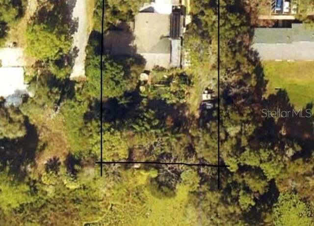 Property at 912 Holiday Ln, Leesburg, FL 34748, 4 beds, 2.5 baths
