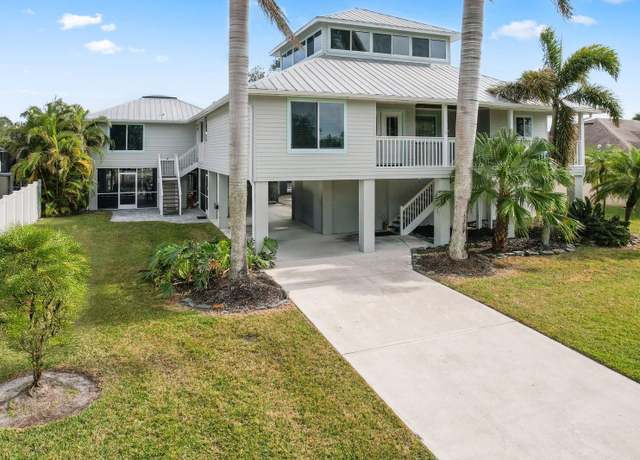 Property at 13477 Irwin Dr, Port Charlotte, FL 33953, 3 beds, 3.5 baths