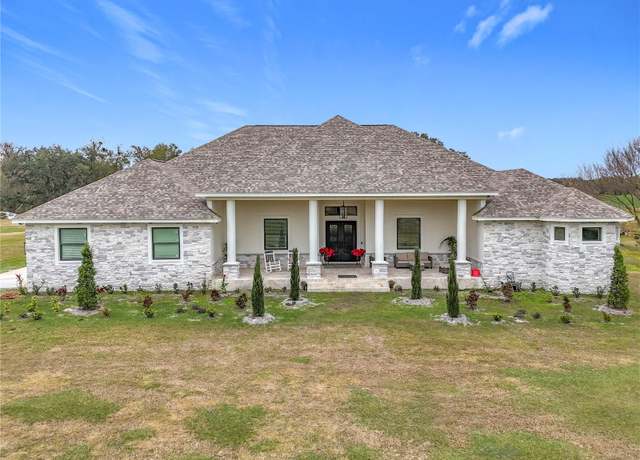 Property at 8459 Harvey Walden Dr, Plant City, FL 33565, 4 beds, 5 baths