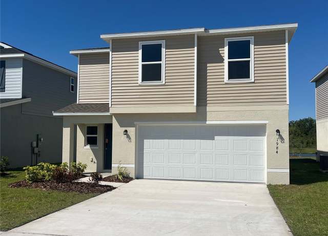 Property at 1984 Golden Beak Dr, Eagle Lake, FL 33839, 4 beds, 2.5 baths