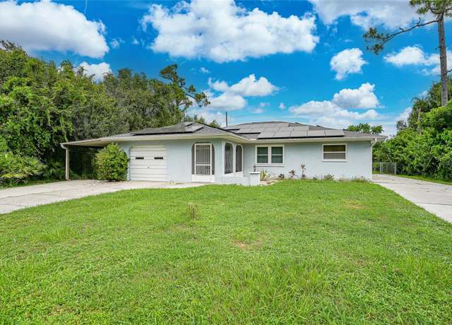 Property at 1074 Darby Dr NW, Port Charlotte, FL 33948, 3 beds, 2 baths