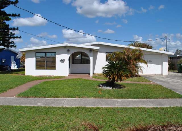 Property at 839 Conreid Dr NE, Port Charlotte, FL 33952, 3 beds, 2 baths