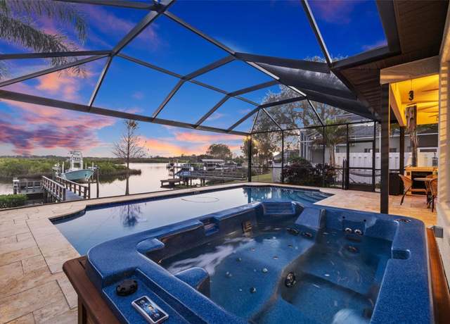 Property at 1881 Riveredge Dr, Tarpon Springs, FL 34689, 4 beds, 2.5 baths